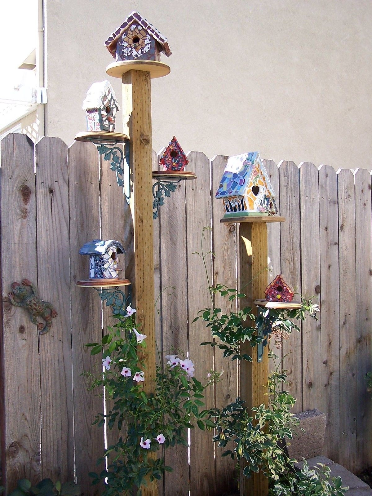 Wooden bird feeder stands