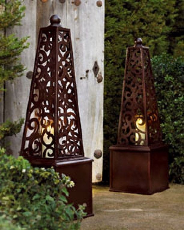 Wow great for a front entry obelisk hurricane lanterns