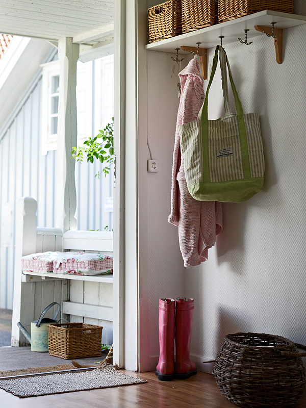 entry shelf with hooks and baskets