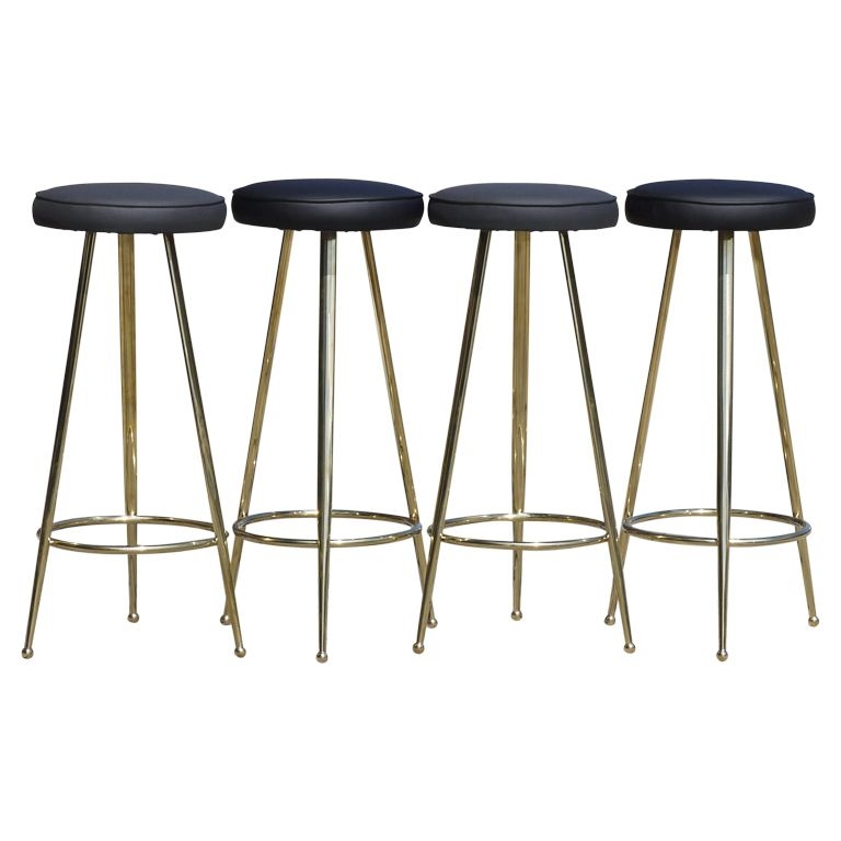 Set of four italian brass bar stools from a unique