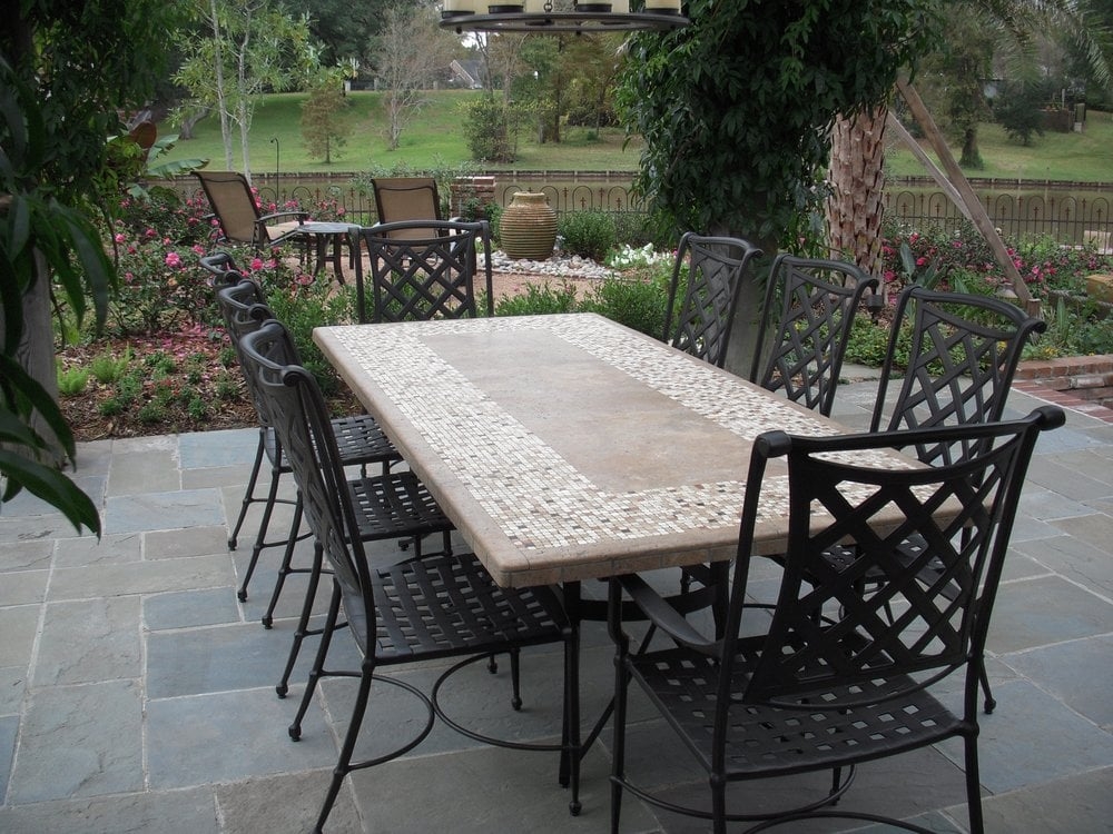 Stone top dining table with outdoor chairs from bay breeze