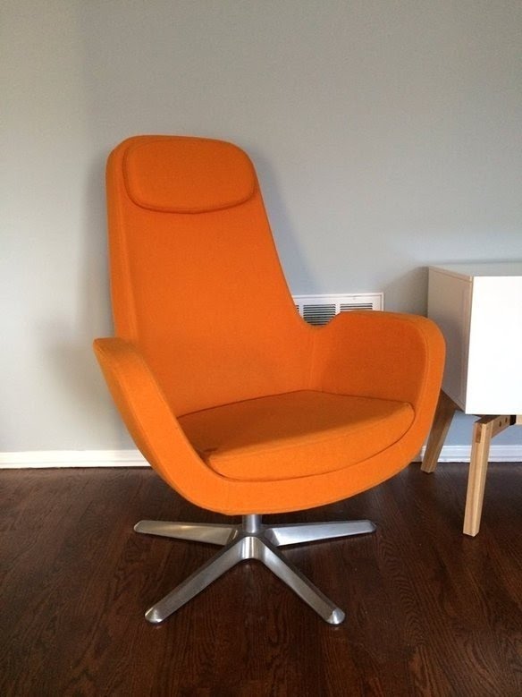 Karlstad swivel lounge chair in orange