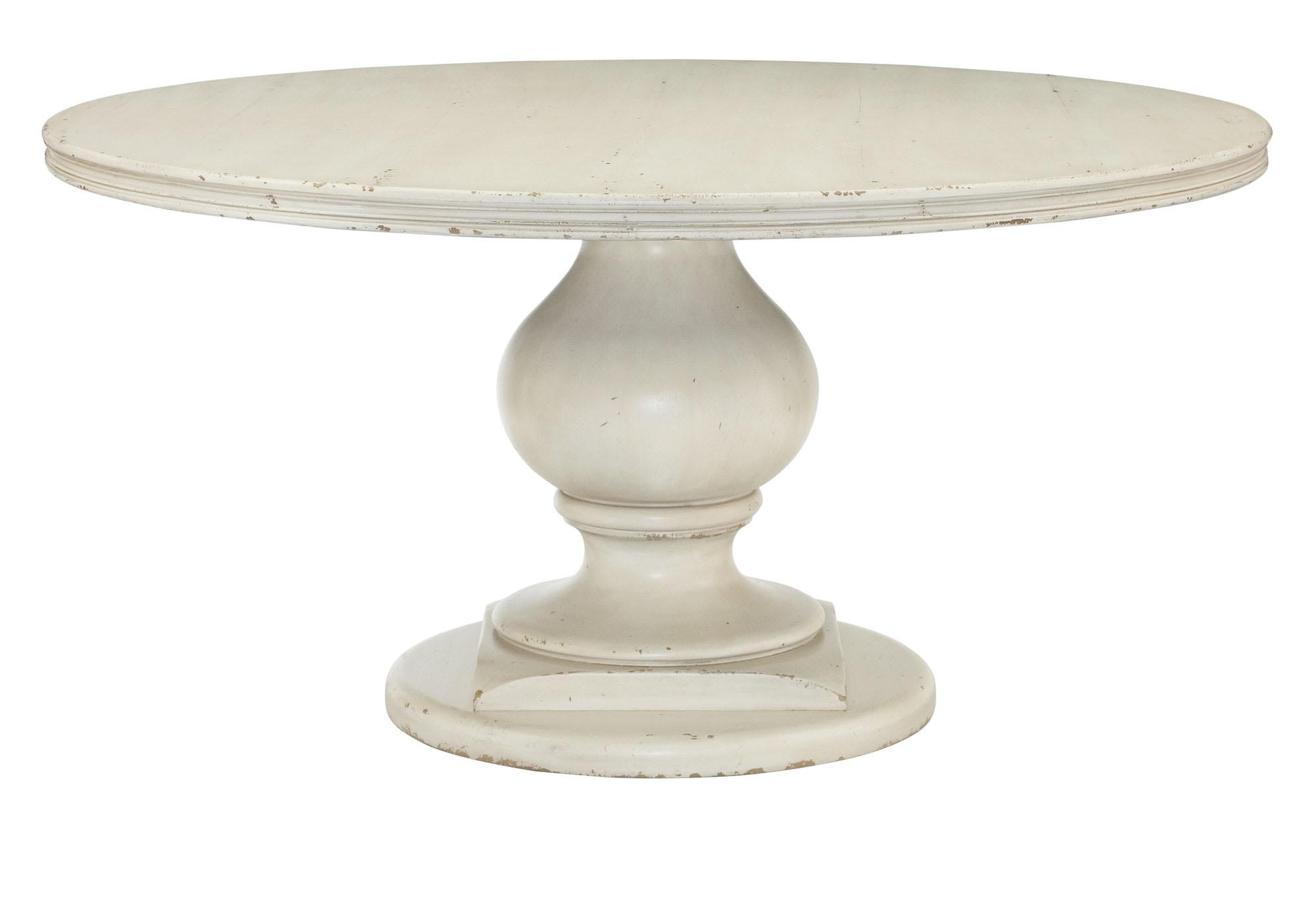 Round white pedestal dining table