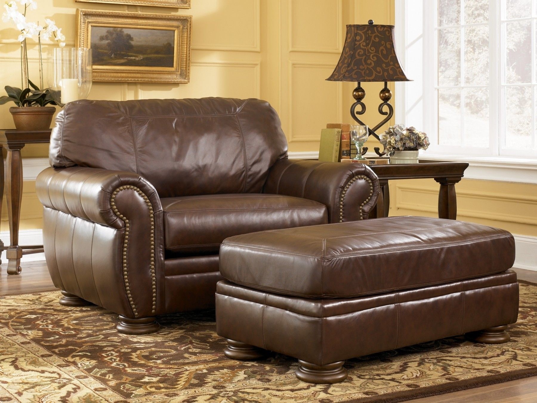 Leather chair and a half with ottoman 19