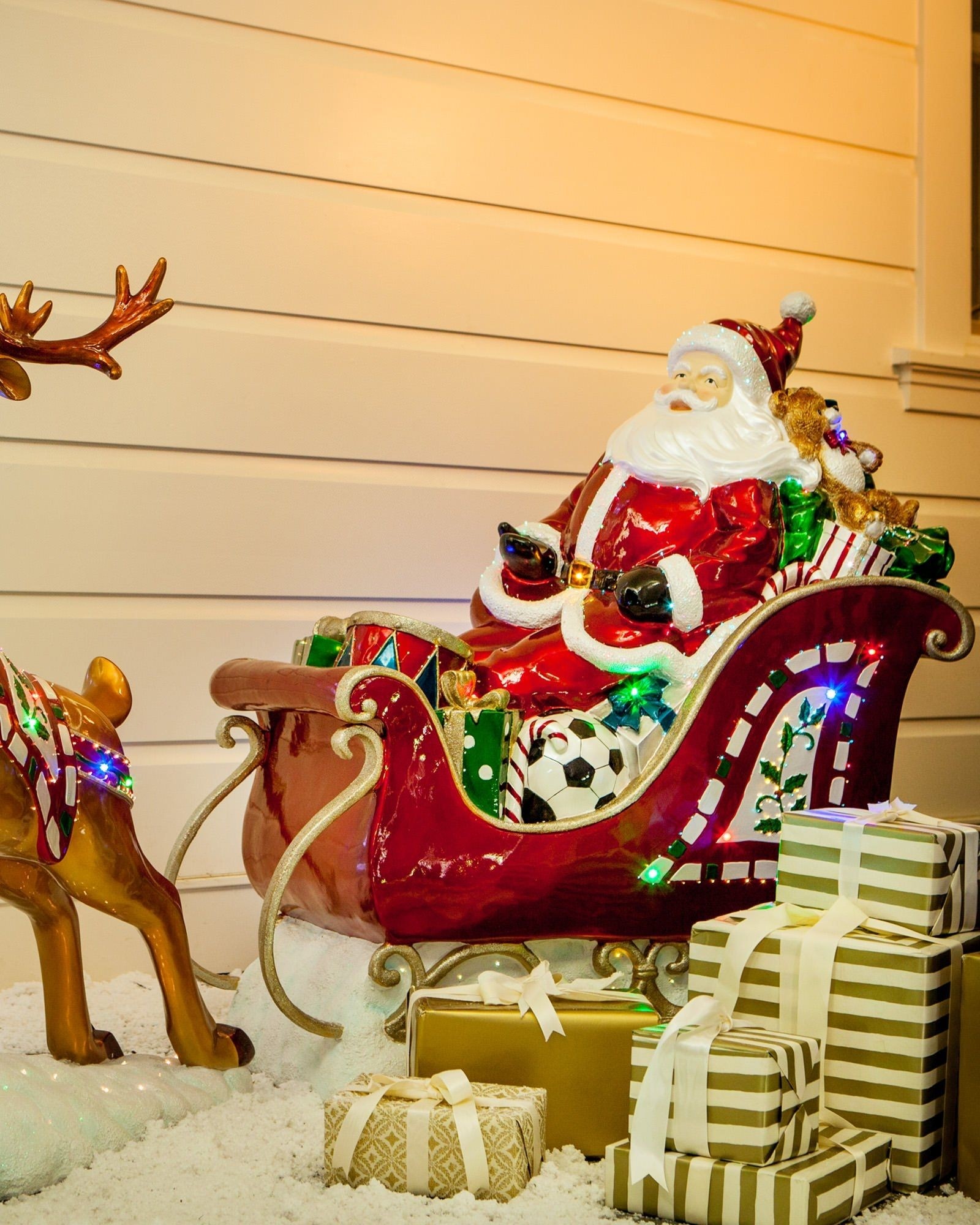 Santa and sleigh with reindeer outdoor decorations