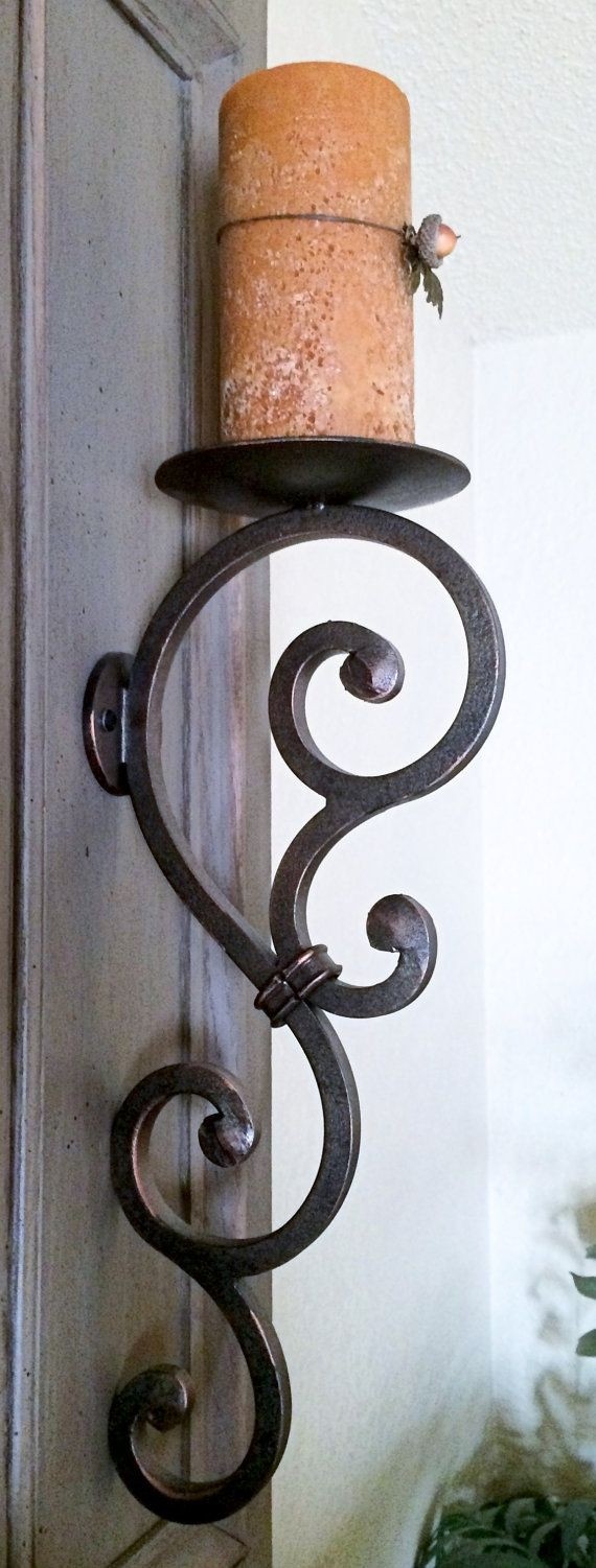 Wrought iron candle wall sconce