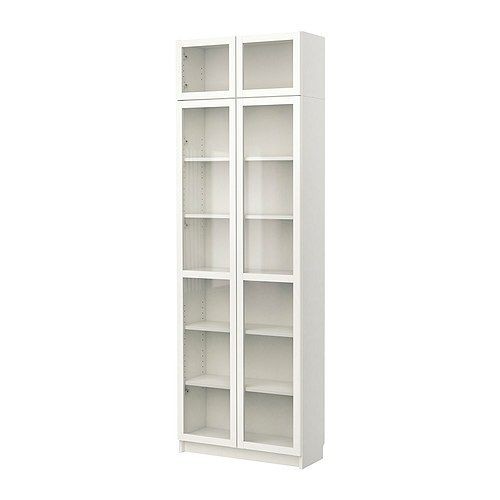 Tall white bookcase with glass doors