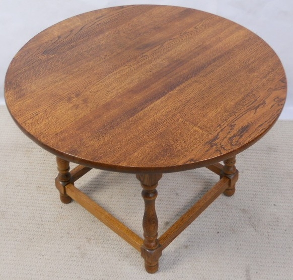 Antique style round oak coffee table