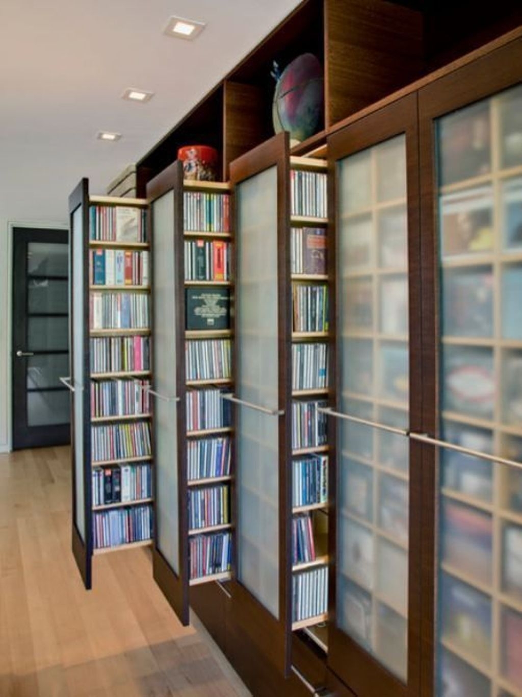 Dvd storage cabinet with sliding doors