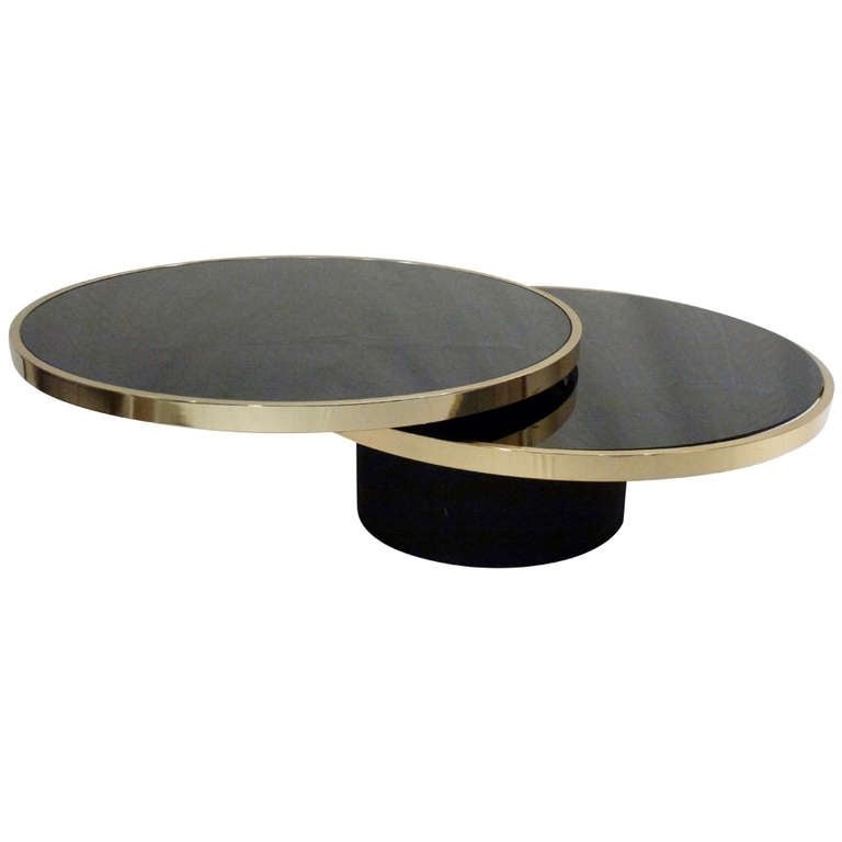 Italian modern brass glass swivel table