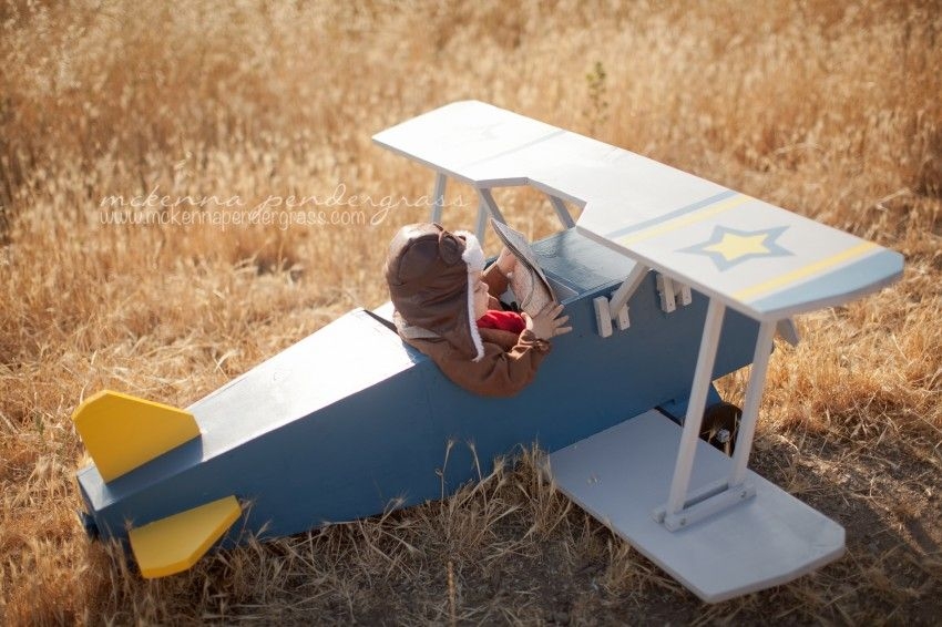 wooden airplane ride on toy