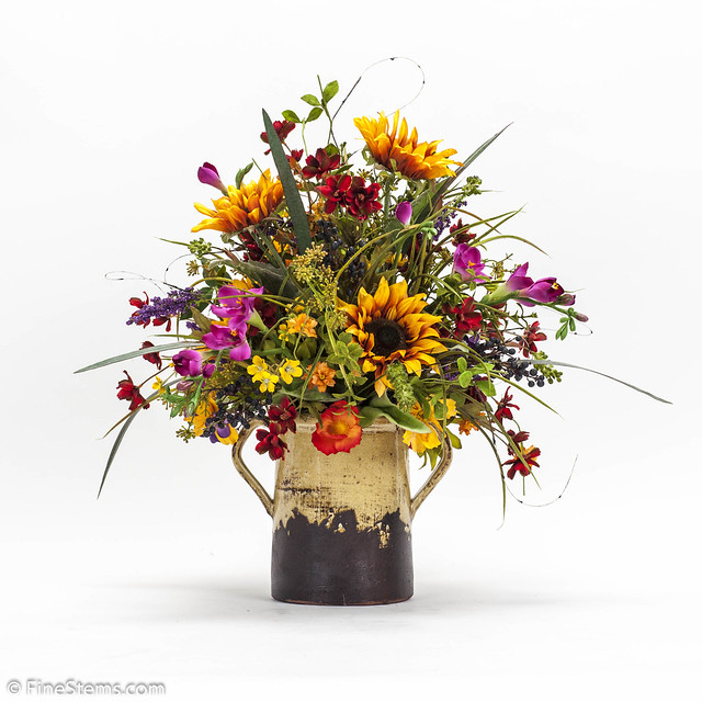 Sunflowers w flowers in ceramic jar traditional plants chicago