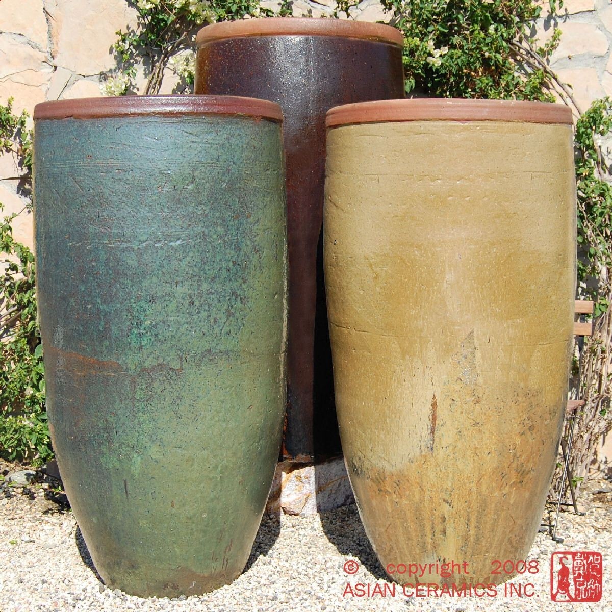 https://foter.com/photos/285/tall-ceramic-planters.jpg