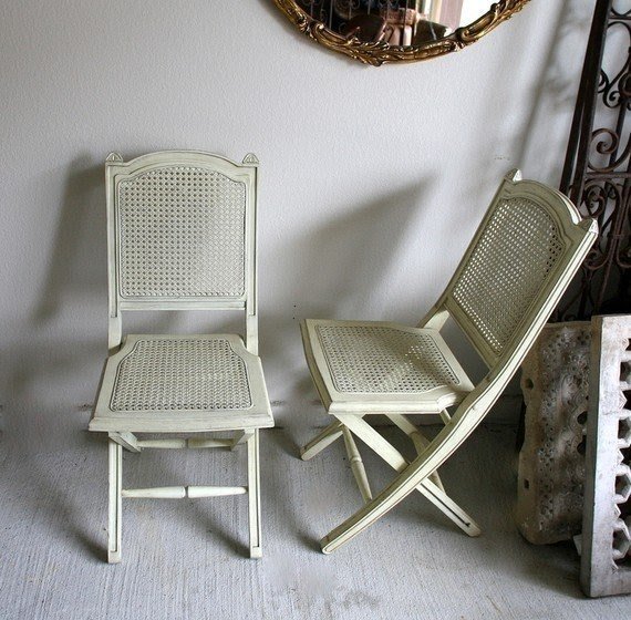 Vintage shabby chic white folding chairs