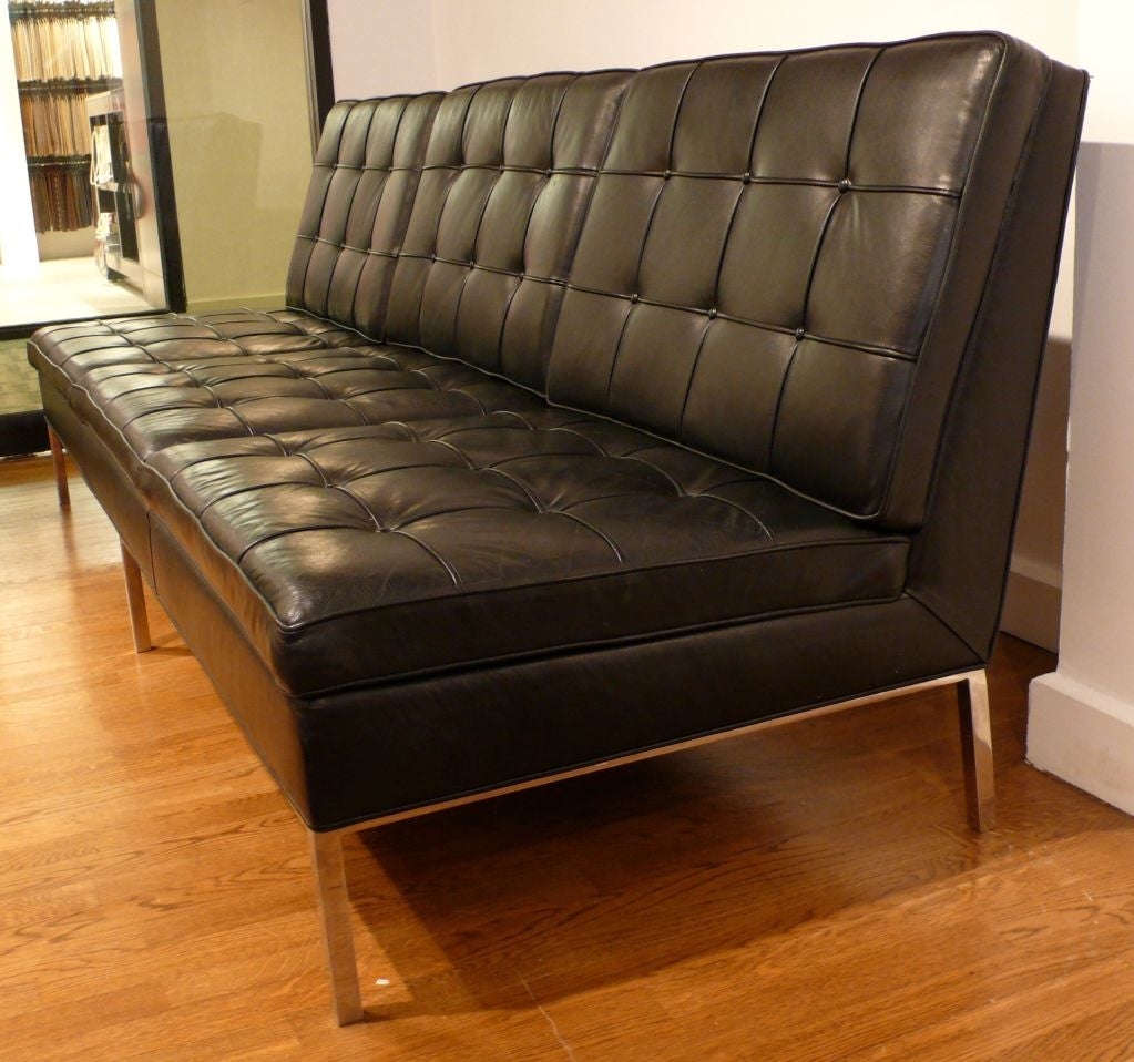 Furniture knoll armless sofa using original black tufted leather also