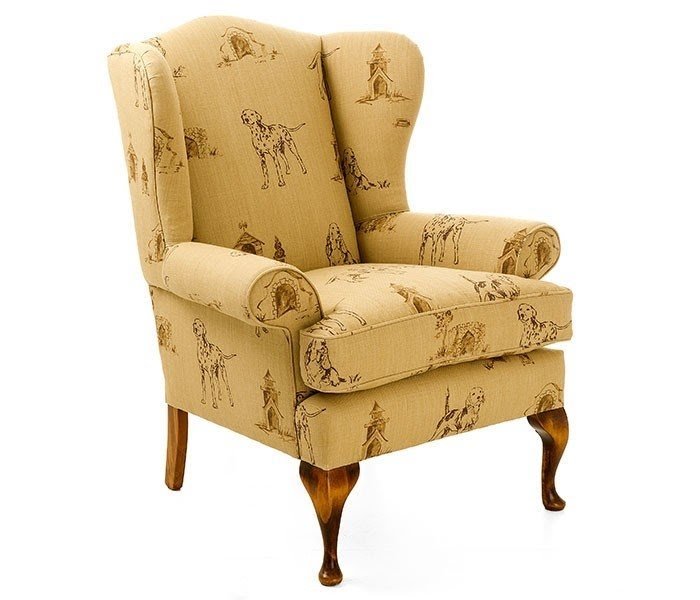 The fireside winged armchair shown here is covered in a