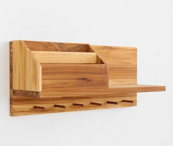 The entryway wooden wall shelf is priced at 149 usd