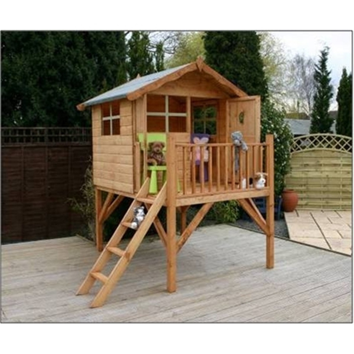 wooden backyard playhouse