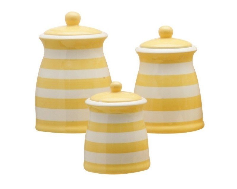 Decorative dish towels canisters and colorful kitchen rugs are great