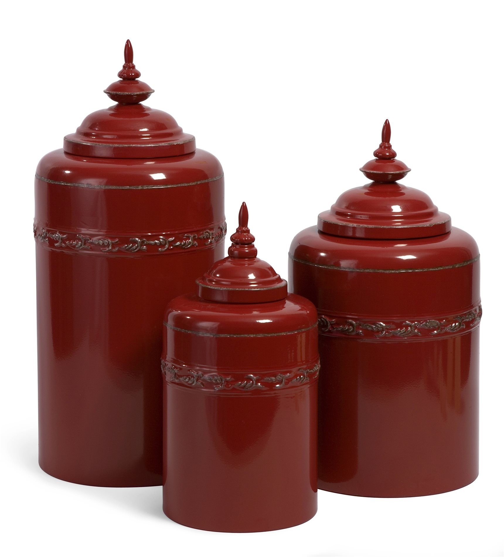 Set of three red iron canisters