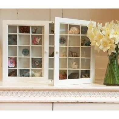 Wall mounted curio cabinet with glass doors