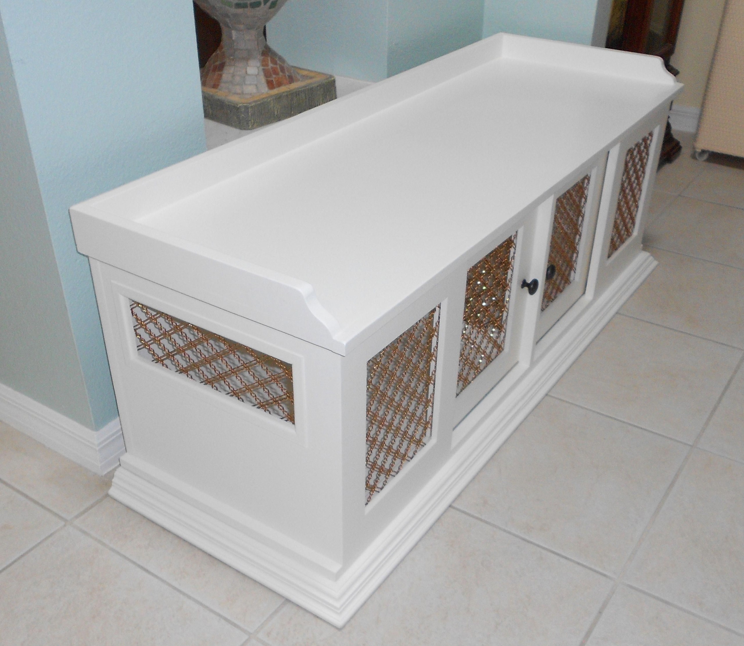 Bench with dog outlet bed underneath