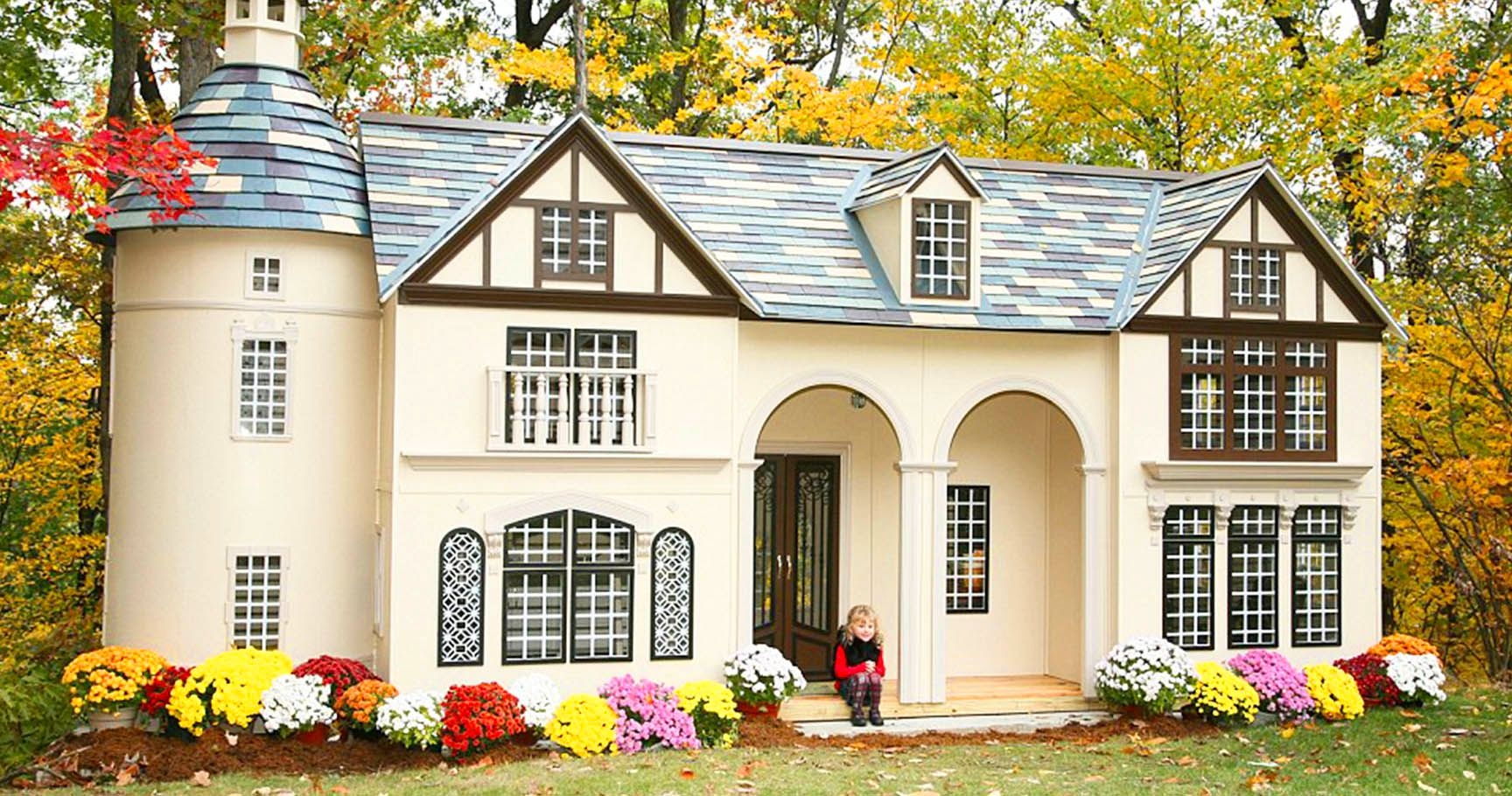 Mansion playhouse incredible playhouse features built in bookshelves