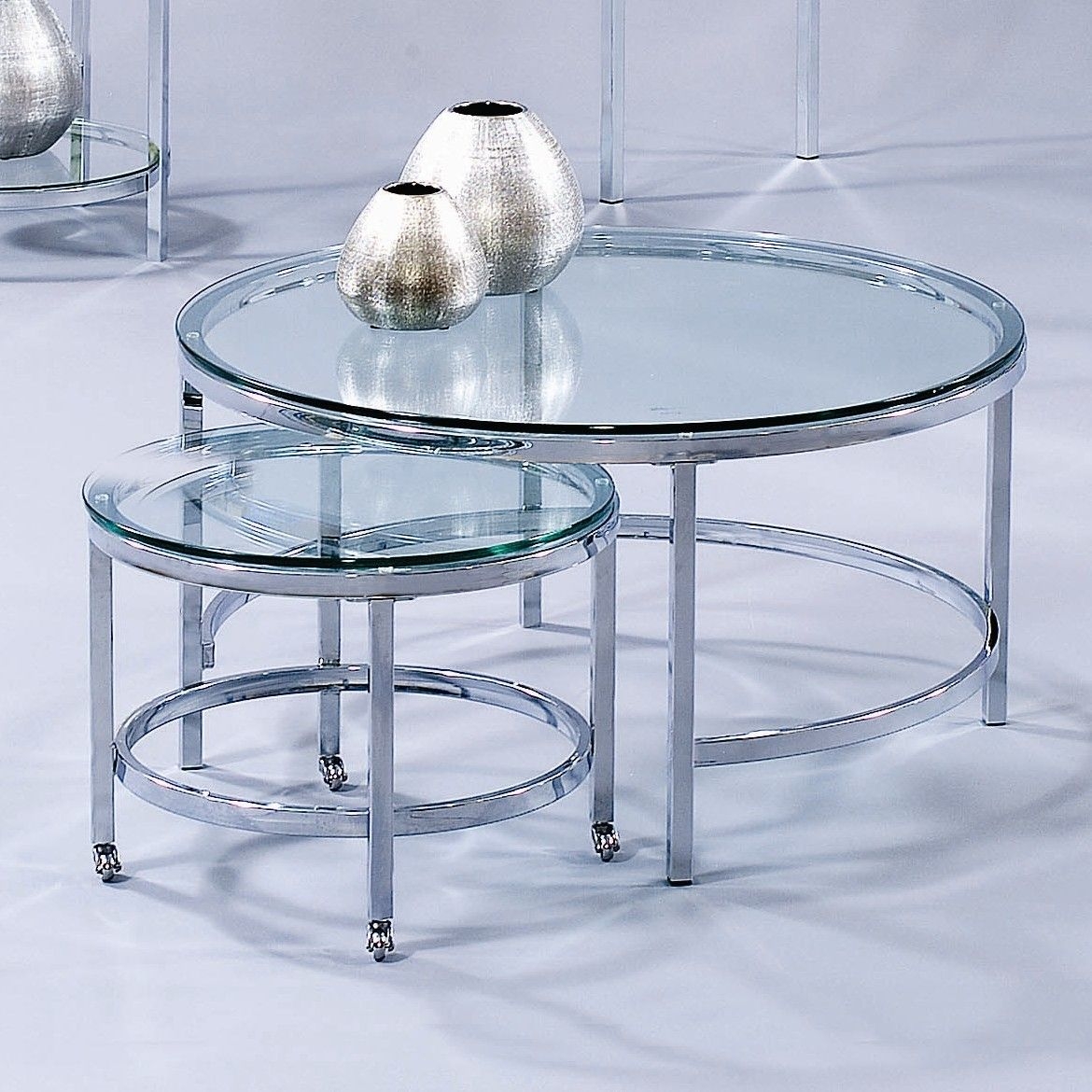 Patinoire modular round coffee table with nested table in chrome