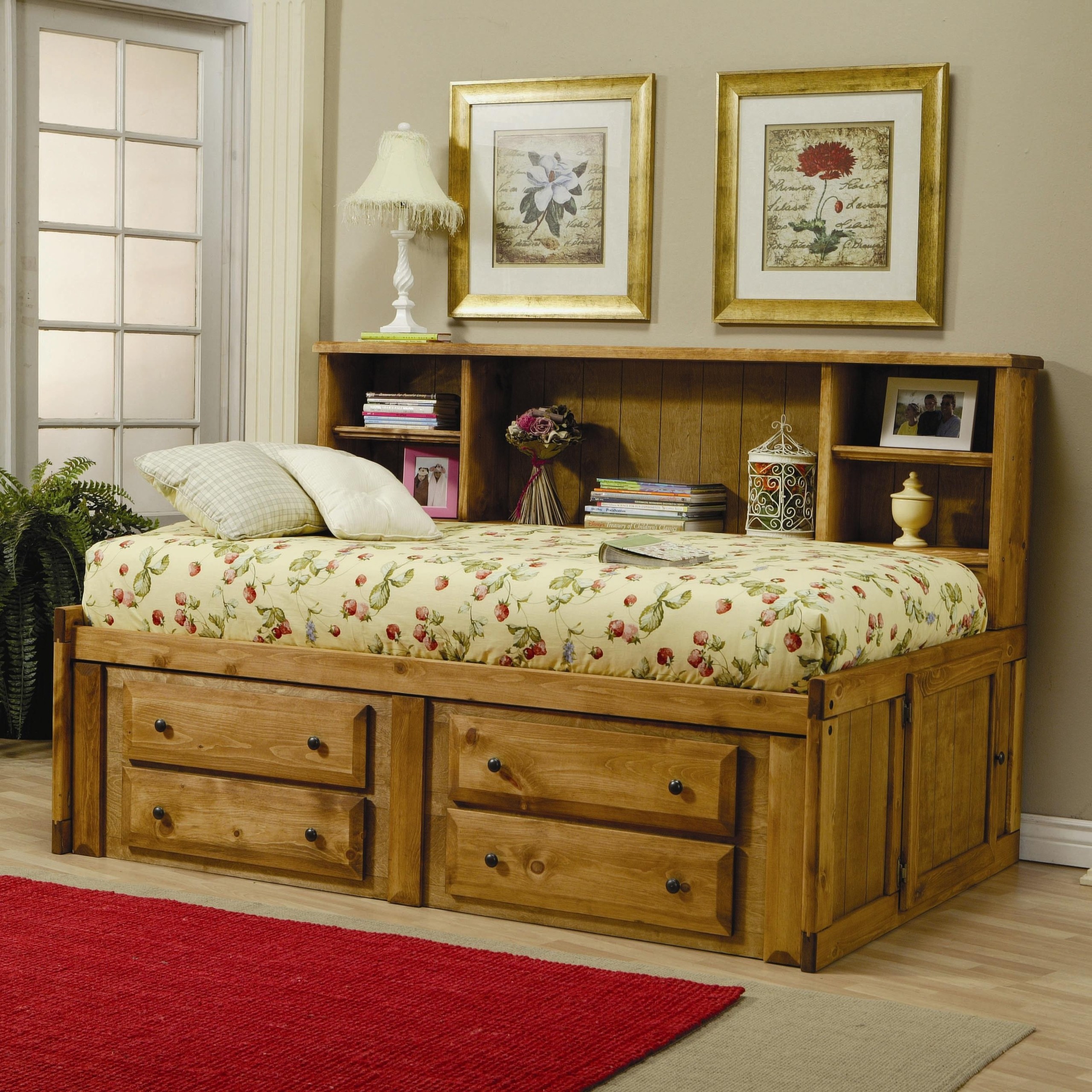 Rustic storage bed design in woodwork with bookcase headboard and