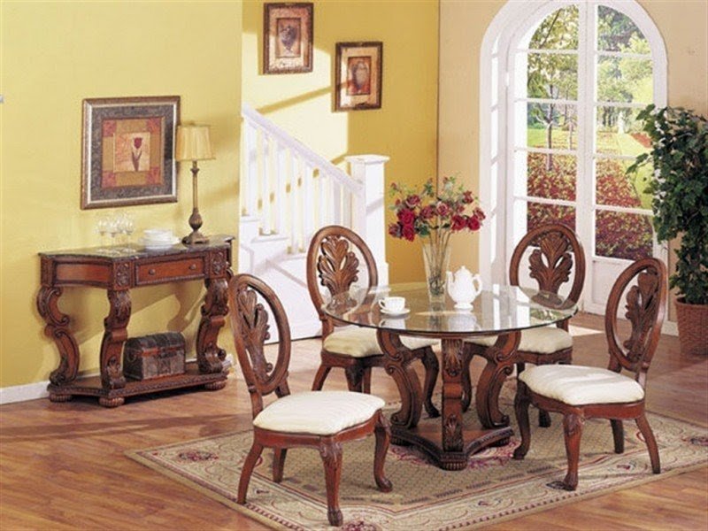 Set with round glass top also beauteous carved wooden dining