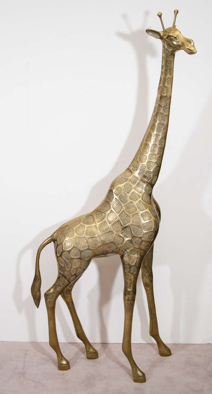 Pair of tall vintage brass giraffe sculptures 1