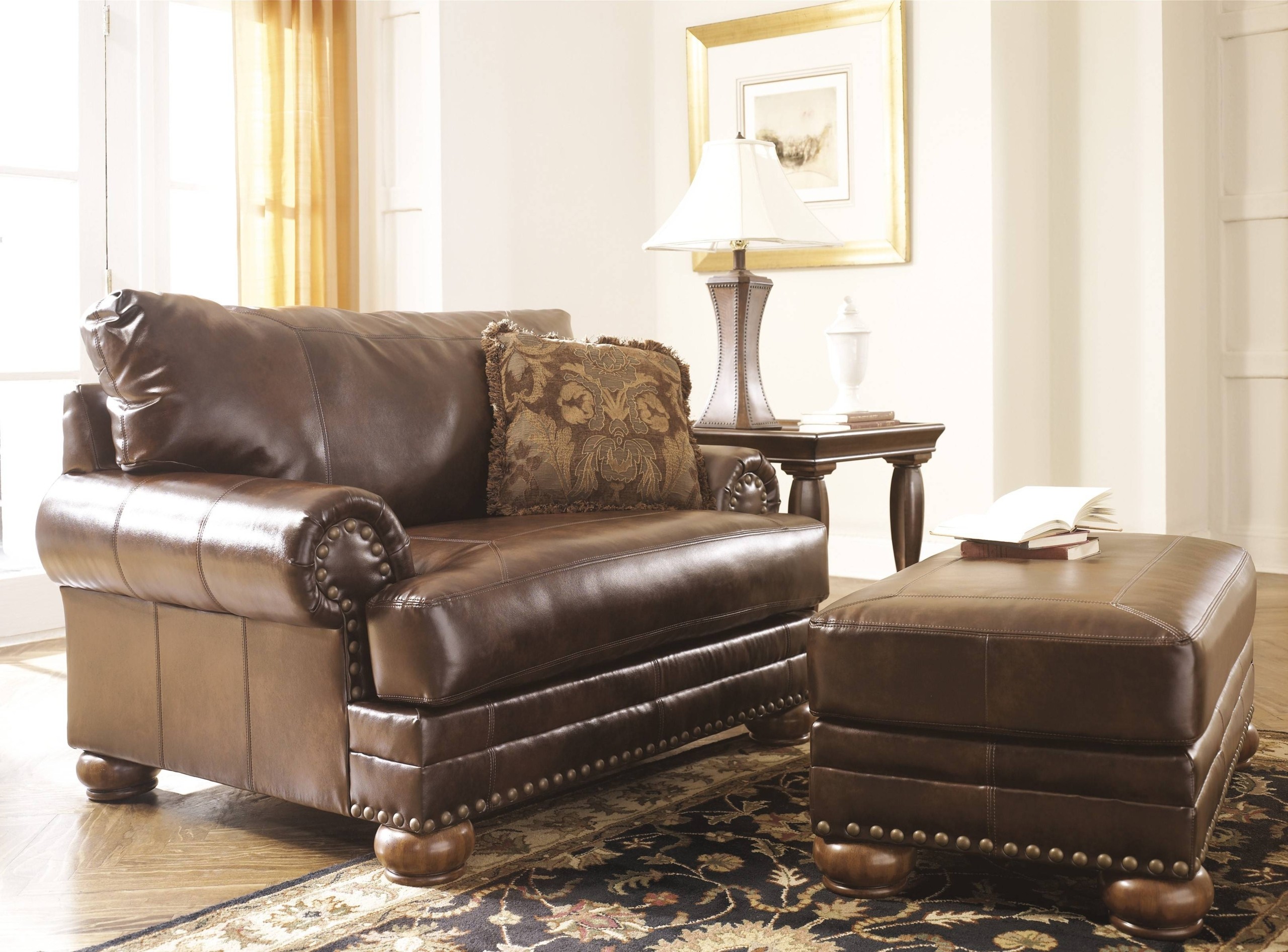 Leather chair and a deals half with ottoman