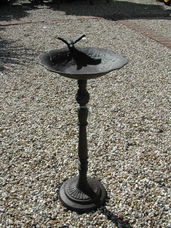 Tall slim cast iron bird bath in bronze