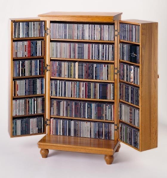 Dvd storage outlet with doors