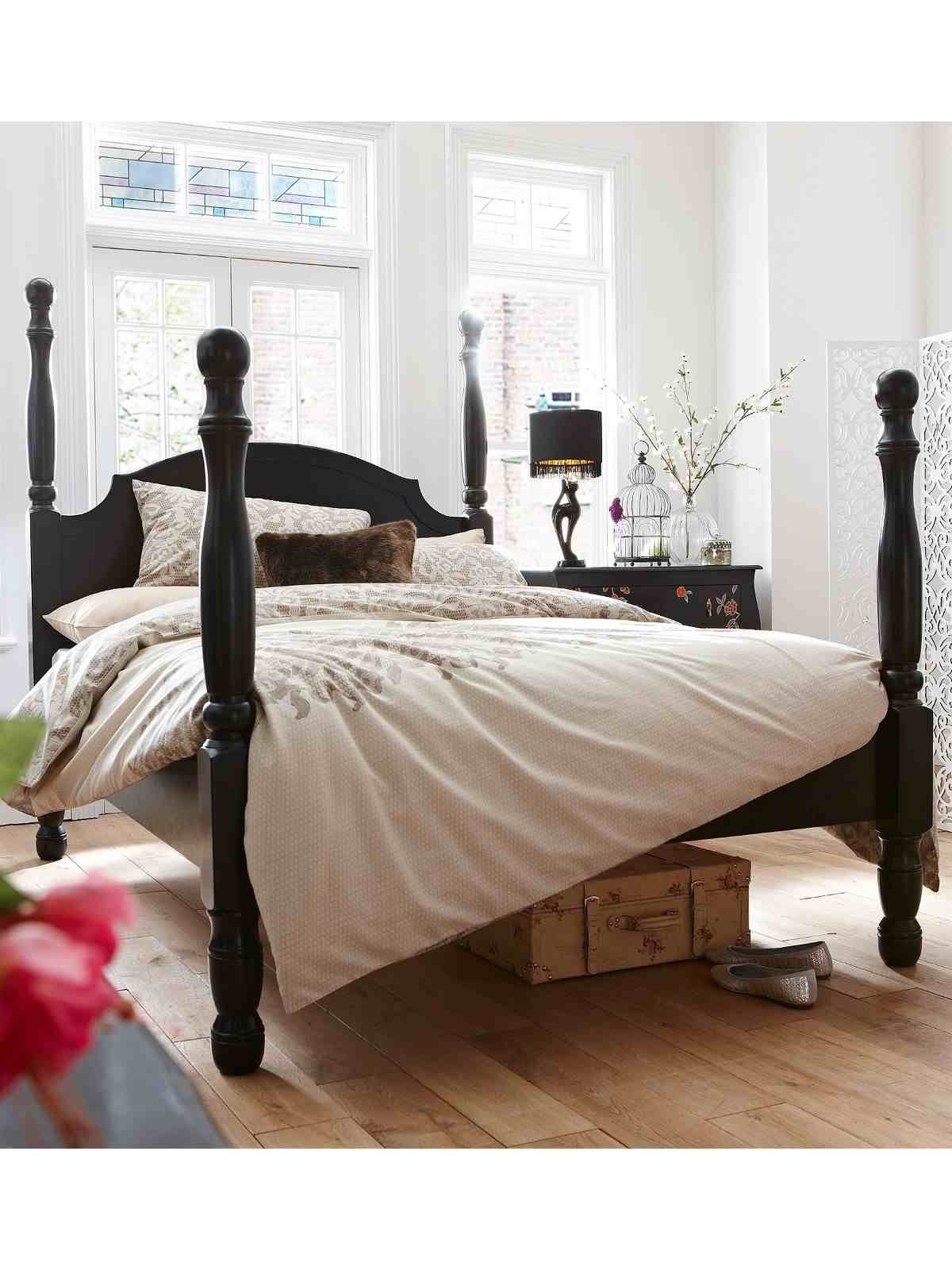 Four poster black bed comfy elegant