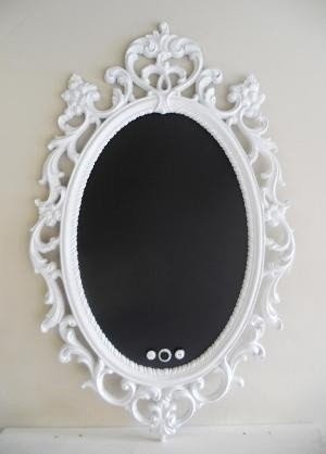 Ornate oval mirrors