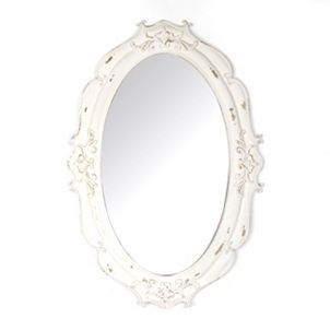 Oval ornate mirror