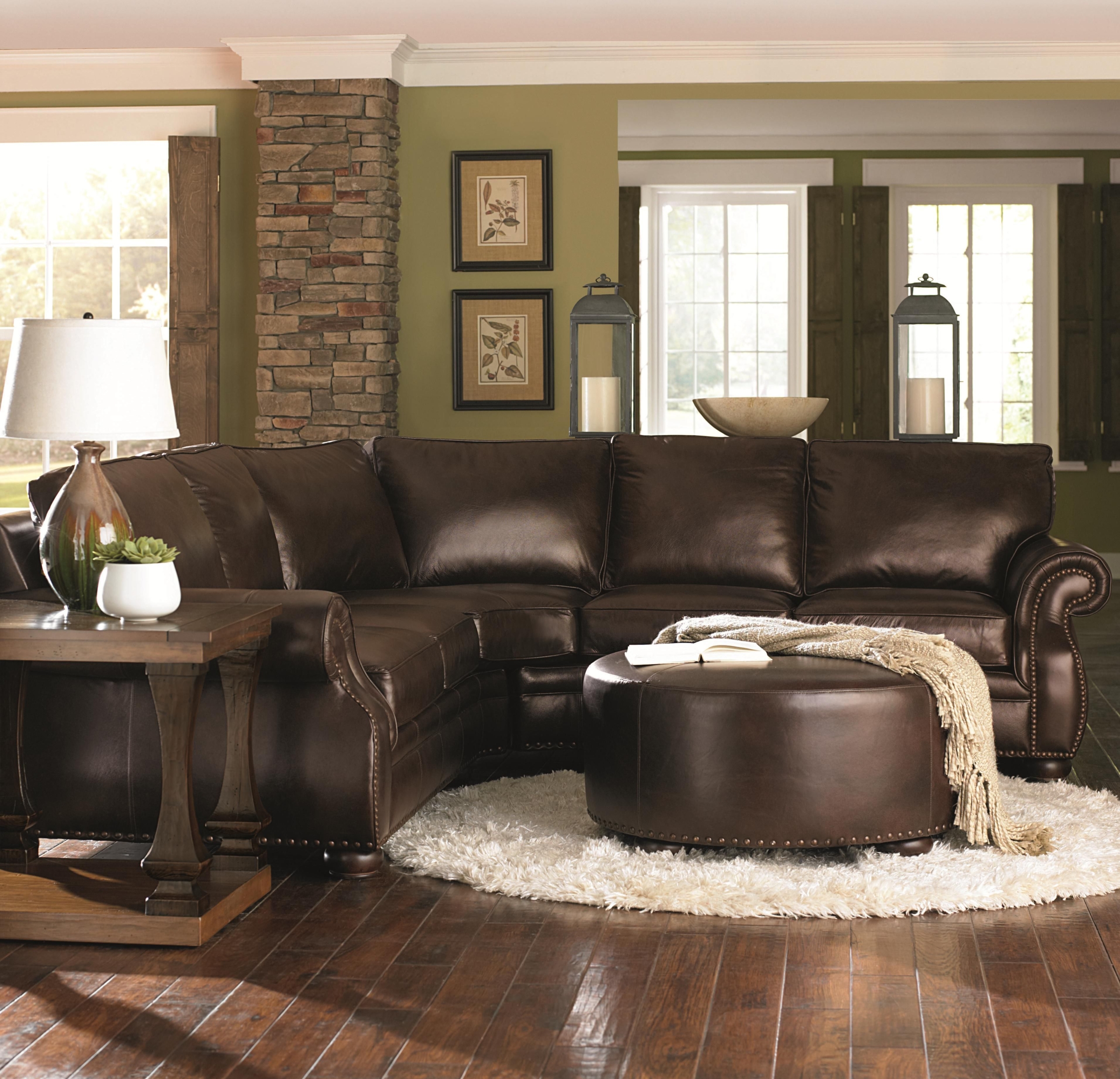 Chocolate brown leather sectional w round ottoman round ottomans