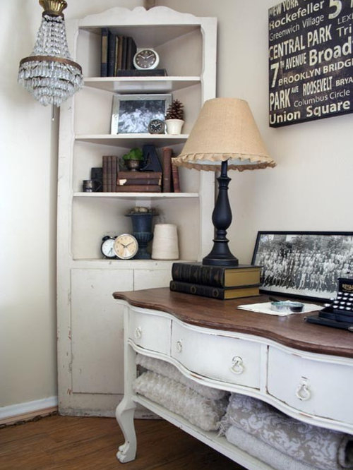 Corner bookcase shelf headboard arrangement idea in traditional