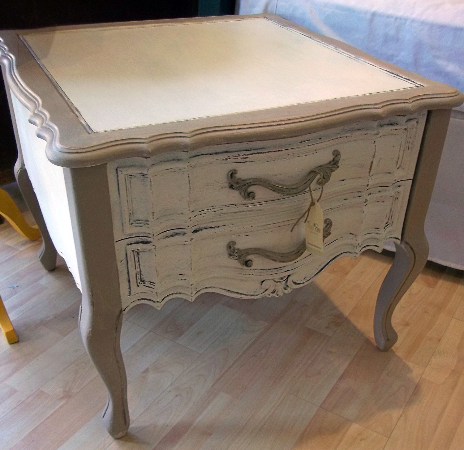 Distressed white and tan end table