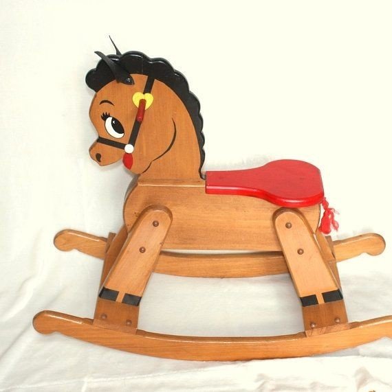 This vintage wooden rocking horse large and sturdy toddler toy