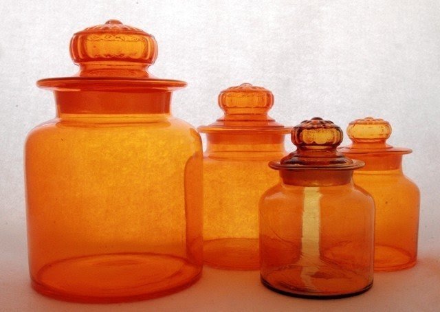 Vintage retro orange glass kitchen or bar canister set