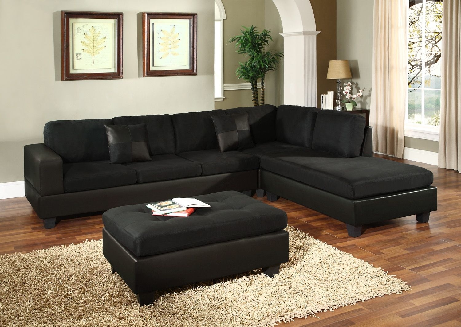 Room with black velvet sofa black velvet sofa with ornamental