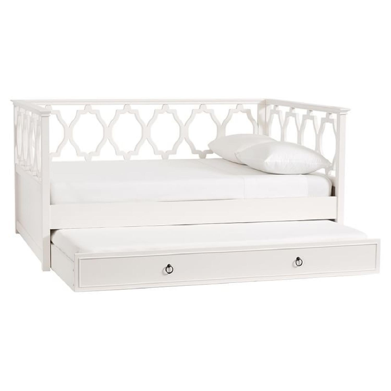 Full size bed with twin trundle