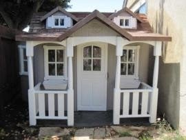 plastic playhouse with kitchen