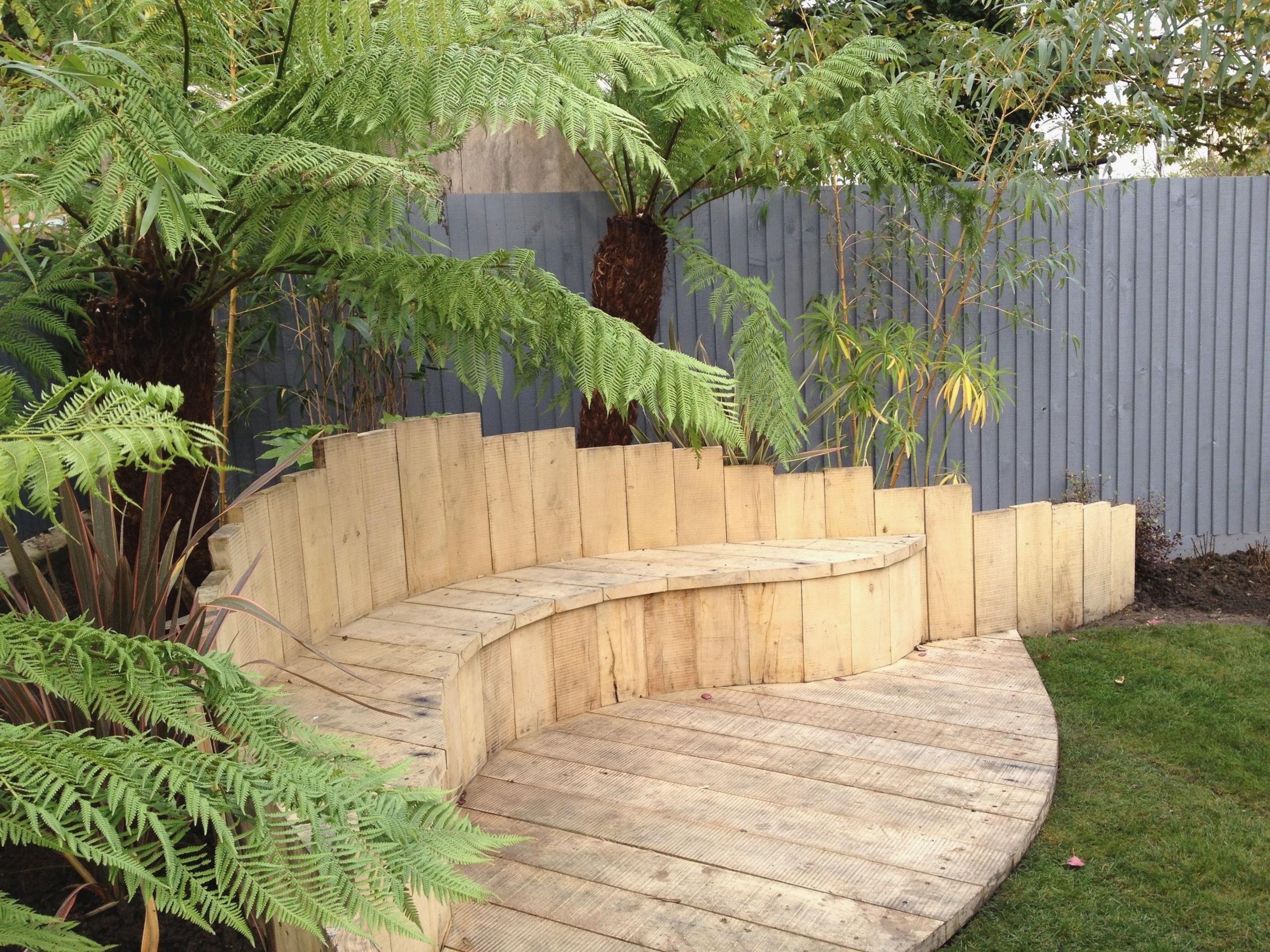 rustic curved garden bench