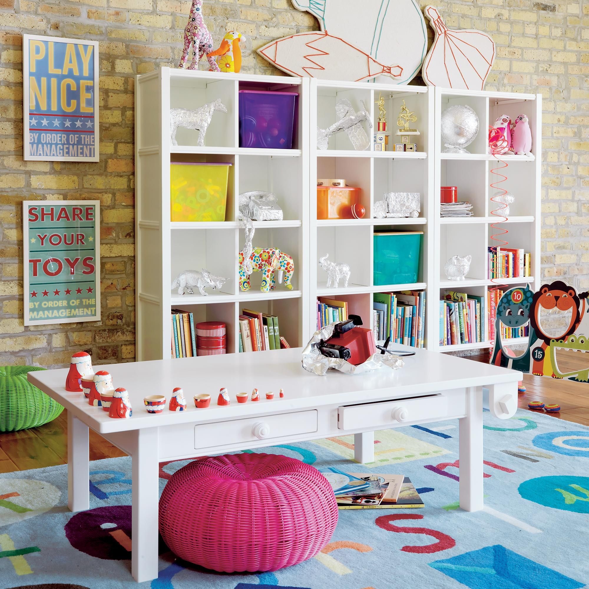 kids activity table with bookshelves