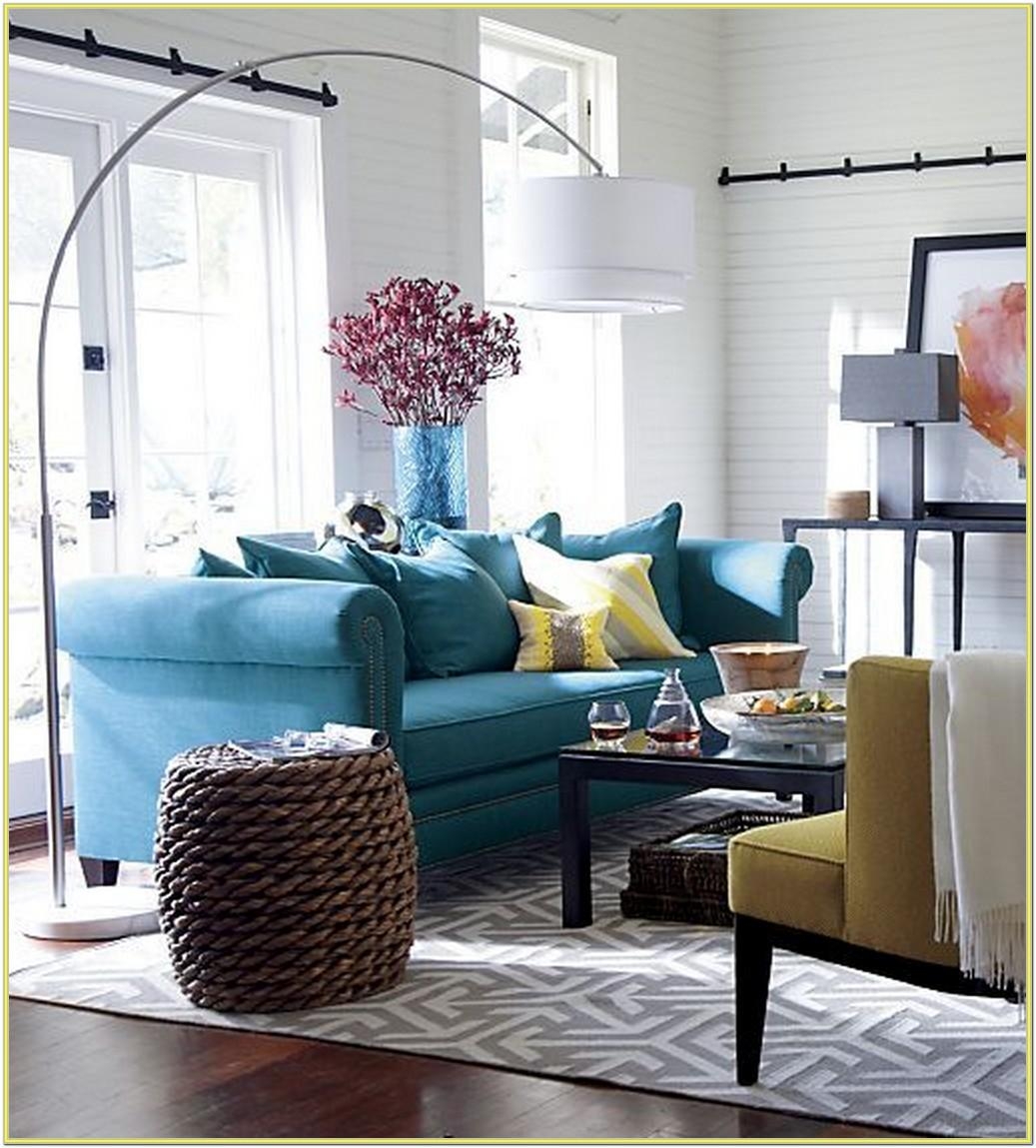 floor lamp behind sectional sofa