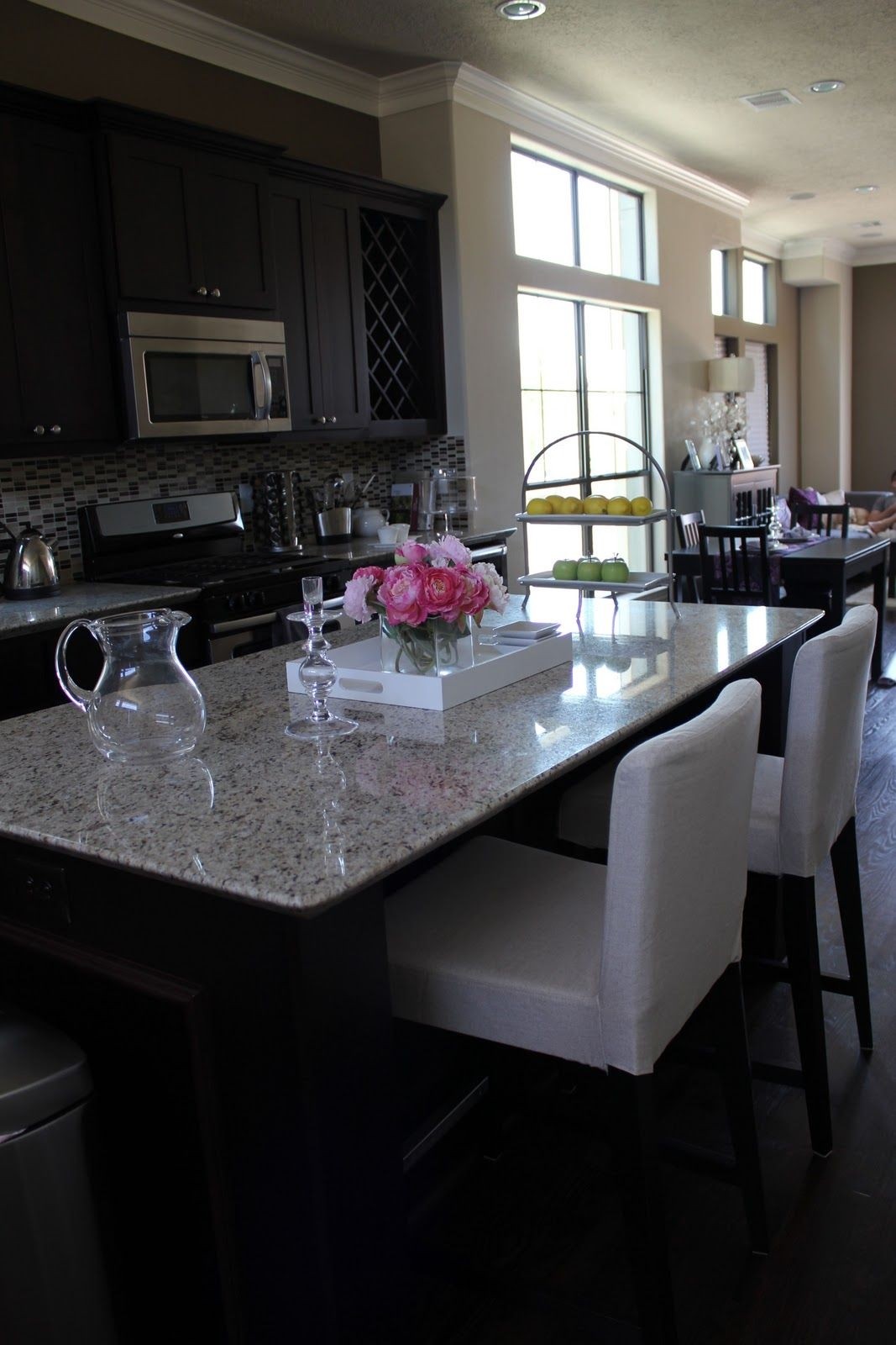 pictures of white kitchens with darker island and dark granite countertops