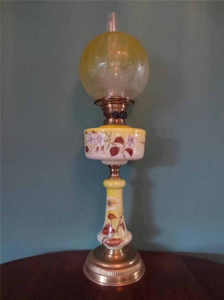 An antique victorian c1890 falks yellow oil lamp with fine